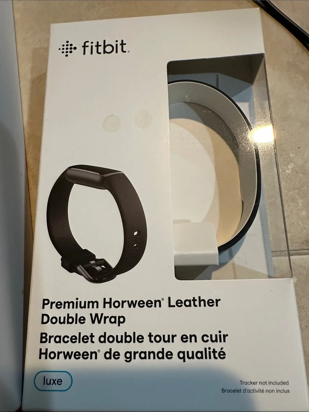 fitbit Charge 4 with Plum Silicone Band and Silver Chain Bracelet